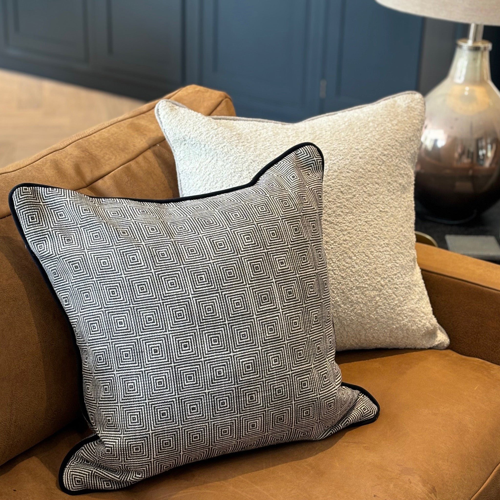 Black and White Geometric Patterned Cushion with Black Piping